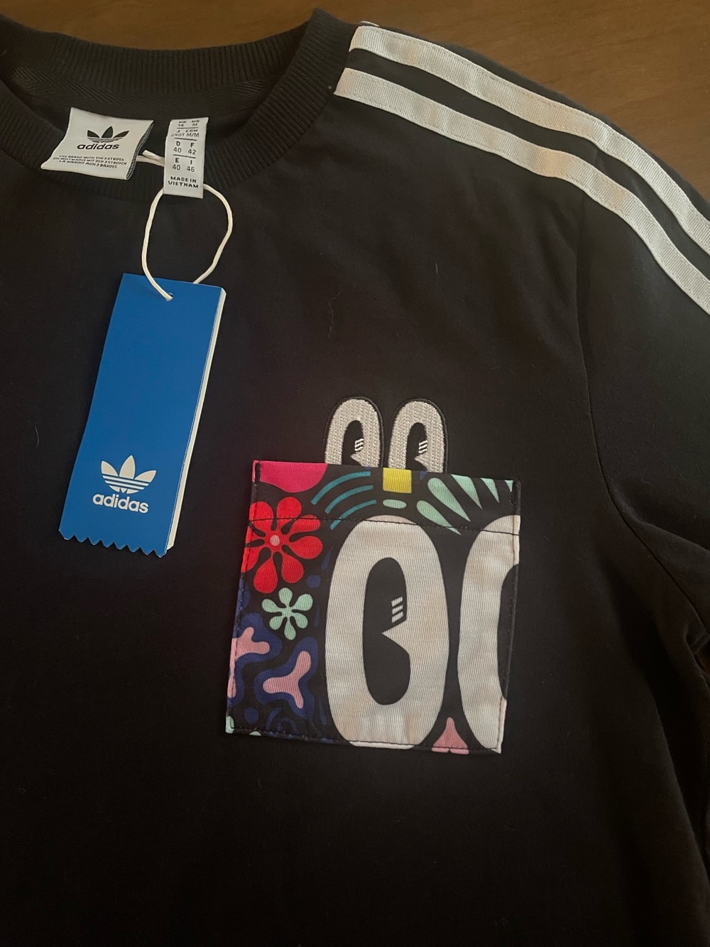 adidas Black t shirt with Floral Pocket Accent